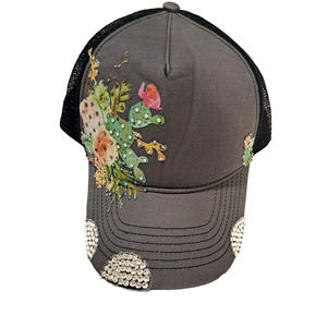 Grey hat with a grunge floral pattern